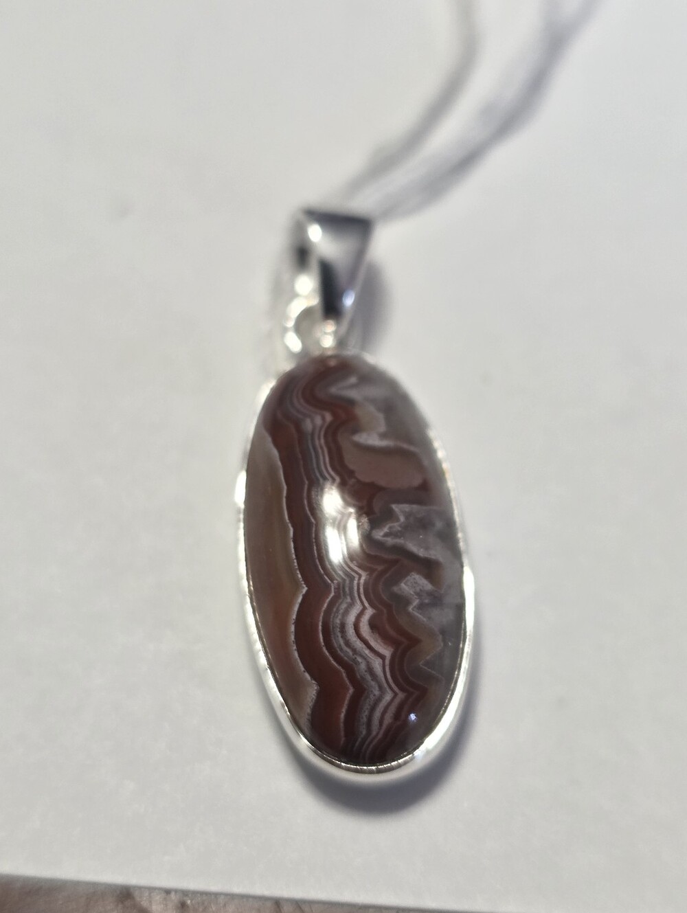 Crazy Lace Agate Pendant .